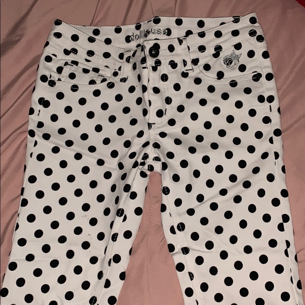 White pants with black dots
